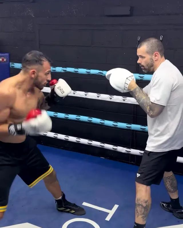 Efe Konuk on the pads with Marlee Dann